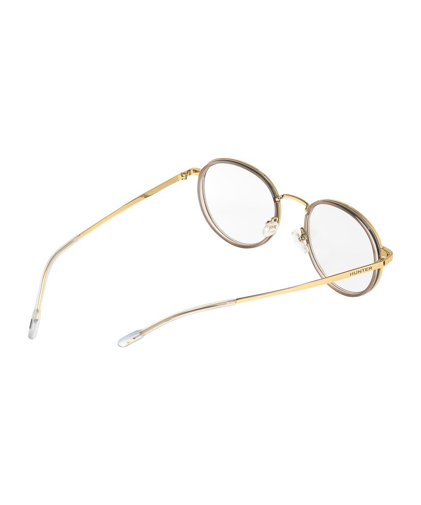 Heonteoaiweeo [Unisex] Round Titanium Sunglasses - Clear Photochromic Htc32