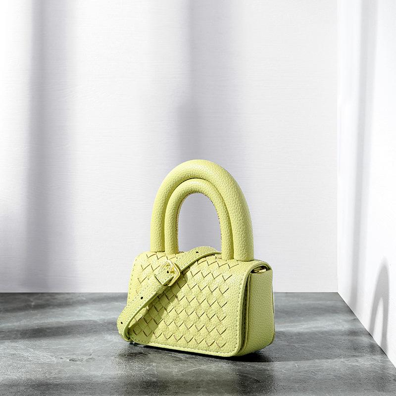 

Flower roll bag niche design hand-woven pottery bag simple small bag handbag girls lipstick bag shoulder