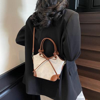 Retro Tasche Damen Frühling und Sommer Trendlinie vielseitige Textur Handtasche Schulter Crossbody Eimertasche