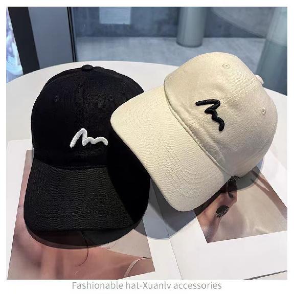 Embroidered baseball cap, lightweight and breathable for outdoor activities, designed to enhance facial features with a simple and stylish look