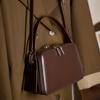 25 Spring/Summer Ear Hanging Design Genuine Leather Women's Commuter and Crossbody Bag