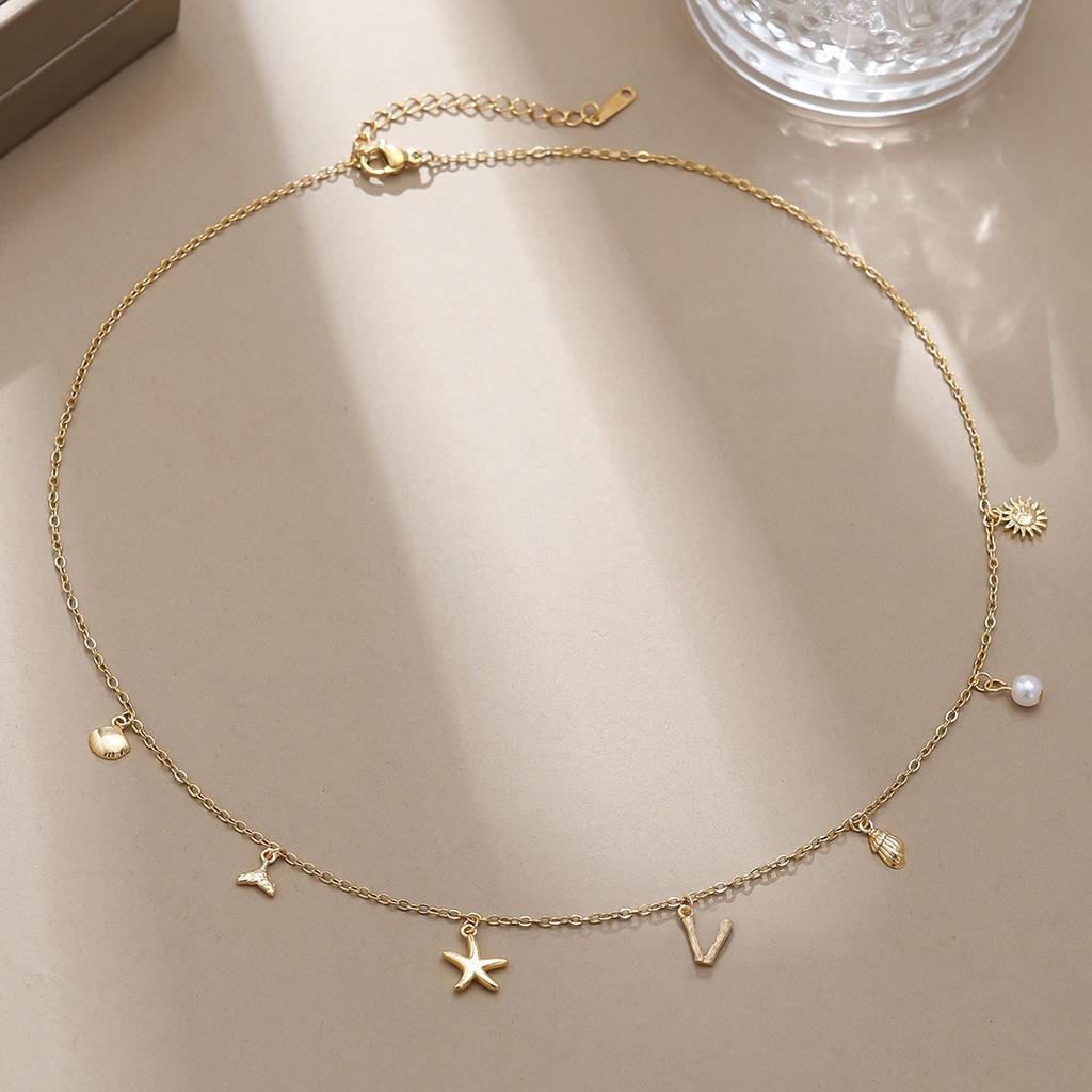 Einfache und modische Goldbuchstaben-Serie Meereskreaturen-Dekorationskette