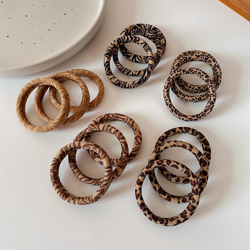 Retro-Leopardenmuster Haargummi einfacher hoch elastischer Handtuchring basic mit Kopfhautband gebunden ohne Beschädigung der Haare Pferdeschwanz