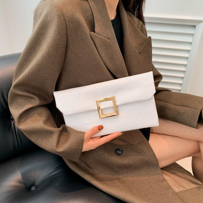 Fashion and exquisite 2025 new solid color trend personalized stone pattern temperament women's dinner hand envelope bag