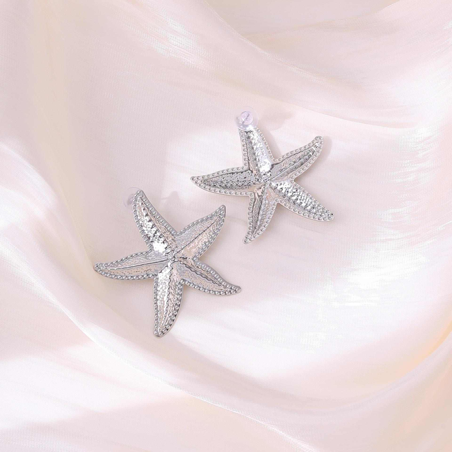 

Cross Ocean Casual Resort Starfish Ribbed Brooch Stainless Steel Earrings, Light Luxury Ear Accessory.