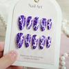 24-Piece Set: Elegant Purple and White Almond-Shaped Wearable Nail Art Tips with Dreamy Lightning Texture.