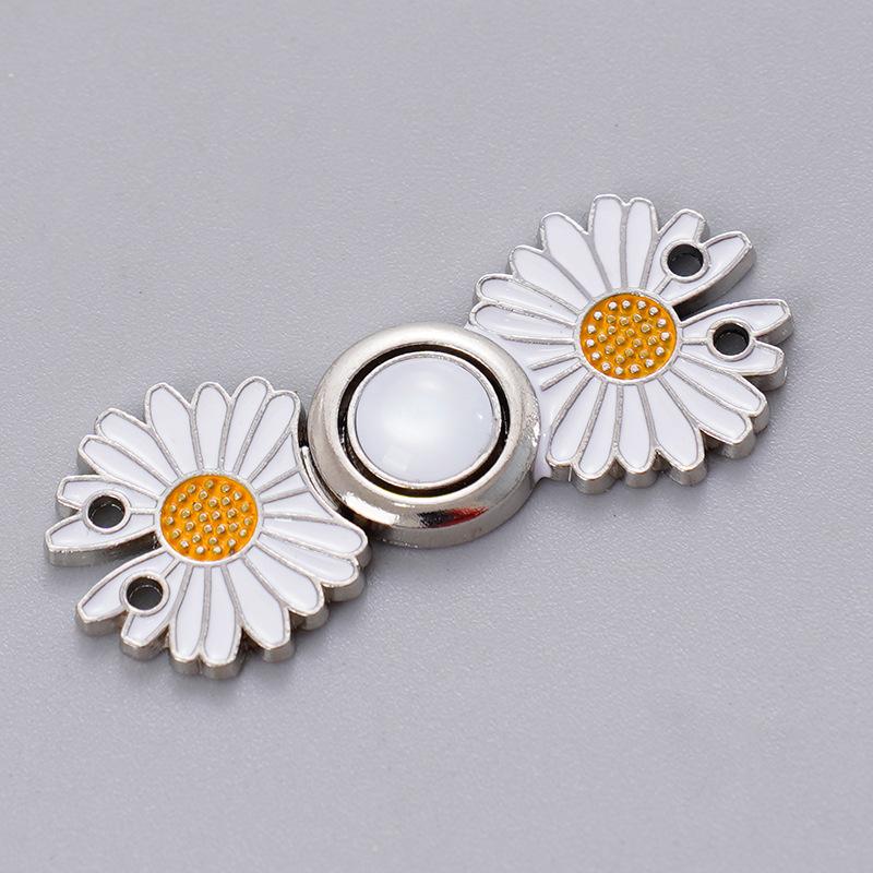 Removable, no-sew, no-nail waist button for jeans. Daisy waist button for slimming jeans.