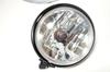 5.5-inch Bates-style headlight, black body, H4 bulb, custom headlight with clear lens.