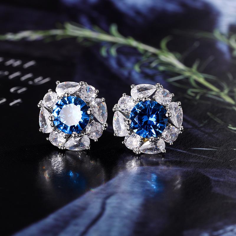 

Ювелирные изделия Медное основание Позолоченная Имитация Синей Шпинели Круглый Темперамент Легкая Роскошь Костюм Женский 12-7мм