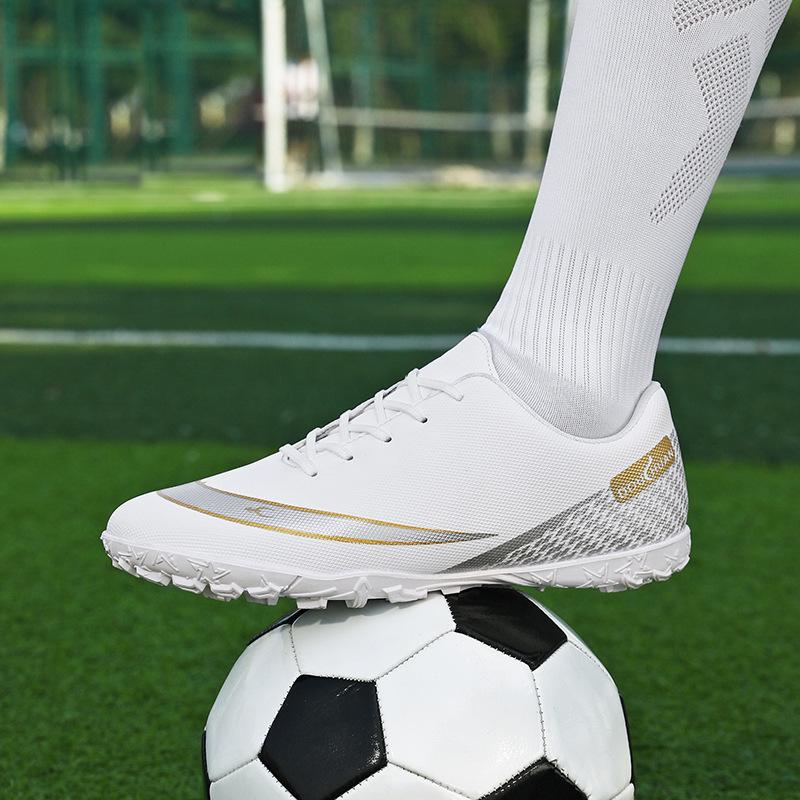 Douchuan neue kalte klebrige gebrochene Nägel Kinder-Fußballschuhe Herren professionelle Sport-Trainingsschuhe Low-Top Sportschuhe Herren