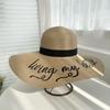 Versatile straw hat women's large brim floppy disk hat summer beach vacation wind letter sunshade sun protection hat