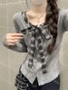 Design sense Chic bow lace-up long-sleeved T-shirt women's autumn new Korean plaid splicing fake two-piece top