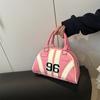 Niche design women's bags, high-end striped contrasting shoulder bags, summer new semi-round underarm bags, messenger bags