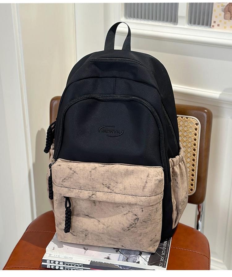 School bag 2025 new tie-dye backpack Korean version fashionable and cute large-capacity school bag casual simple backpack