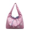 Large capacity double-sided canvas bag women's 2025 new color letter bow shoulder bag fashion student schoolbag