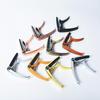 Zirconium Alloy Wood Grain Metal Capo: Multifunctional Transposition Clip for Guitar and Ukulele.
