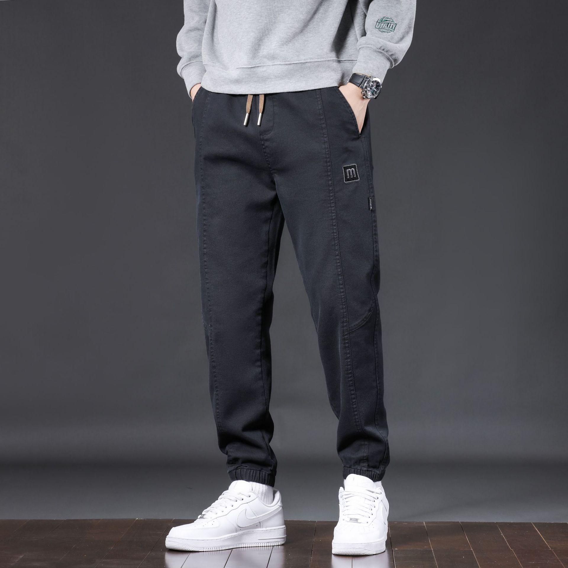 

Новые модные мужские облегающие повседневные спортивные штаны на весну и осень L (60 kg)