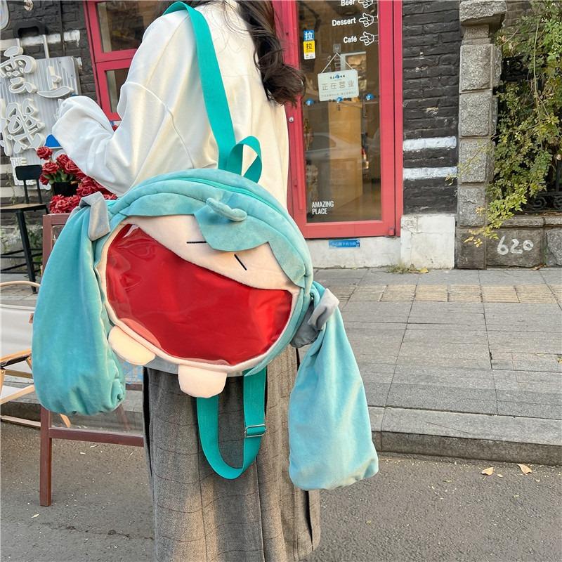 Cute girl two-dimensional green big-eared girl backpack doll backpack student transparent bag