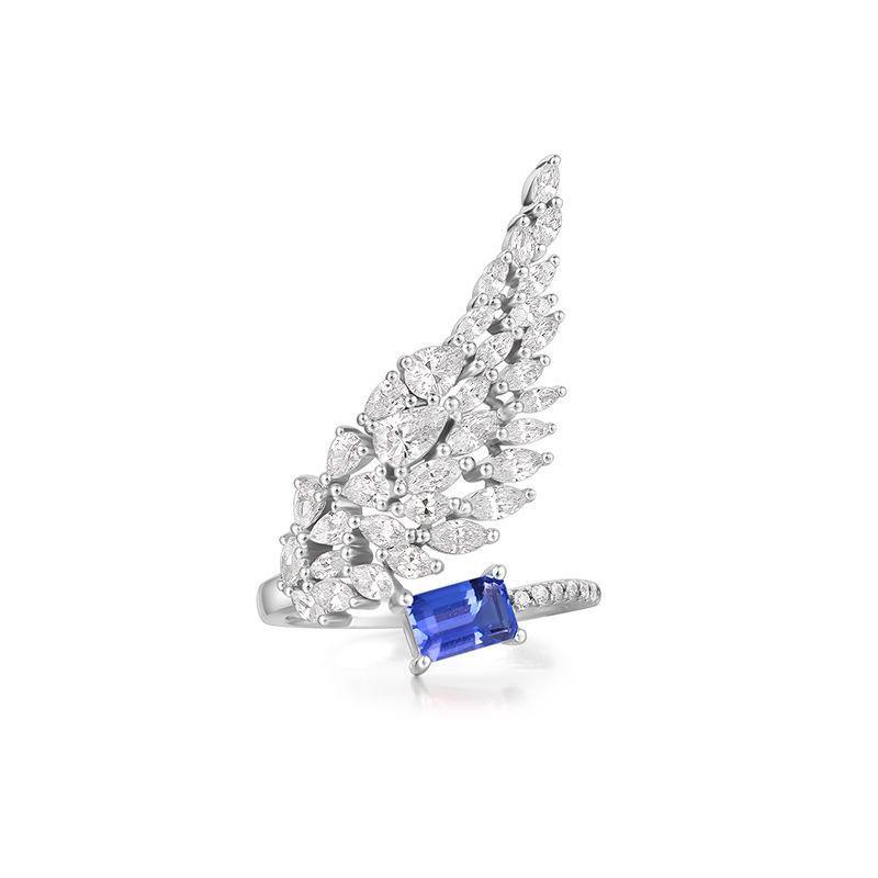 

Imitation Tanzanite Colored Treasure Set, Light Luxury Full Of Diamonds, Angel Wings, Open Ring, Asymmetrical Stud Earrings.