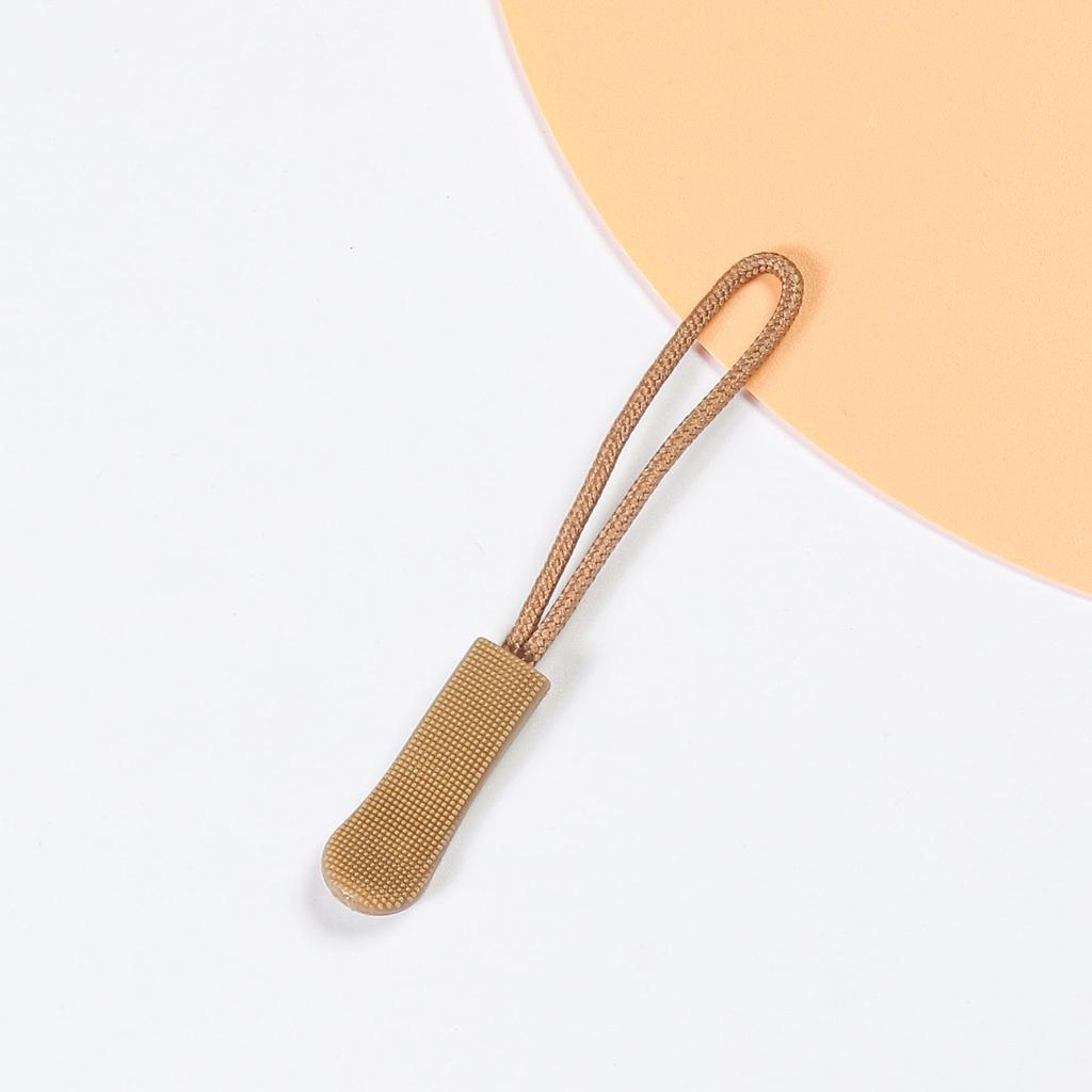 Gekleurd TPU-accessoire met rupsvormig ritssluitingkoord