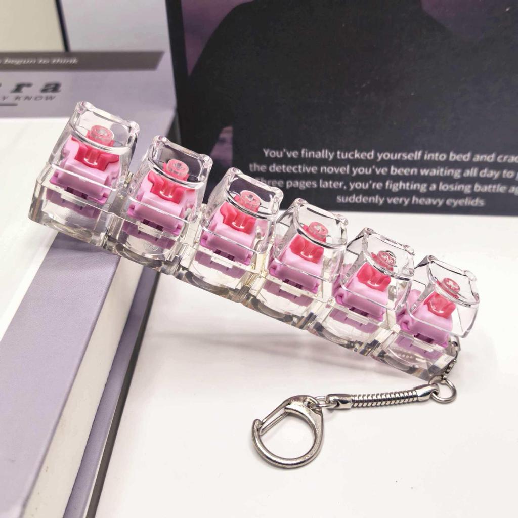 Stummer mechanischer Tastatur-Schlüsselanhänger mit 5,6 Kreuzachsen-Tasten und hochtransparenten Tastenkappen; Dekompression Spielzeug.