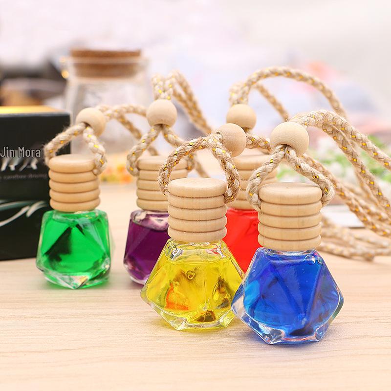Car Interior Perfume Hanging Ornament - Long-Lasting Air Freshener & Aroma Diffuser for Rearview Mirror.