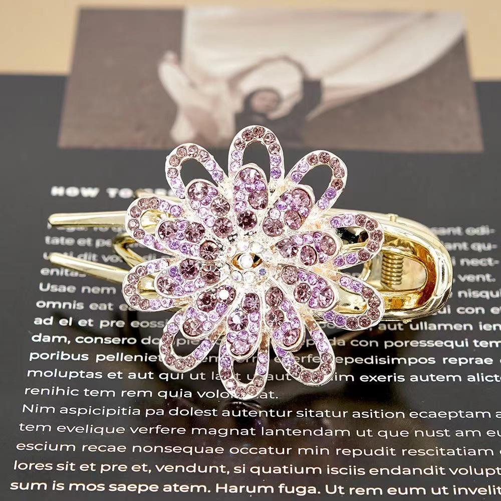 

Заколка для волос со стразами и цветком в виде трех зубцов - элегантный аксессуар для волос фиолетовый