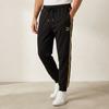 Puma Colorblock Locker Fit Tapered Retro Strick-Laufhose Herren Unterteile Schwarz 62582301
