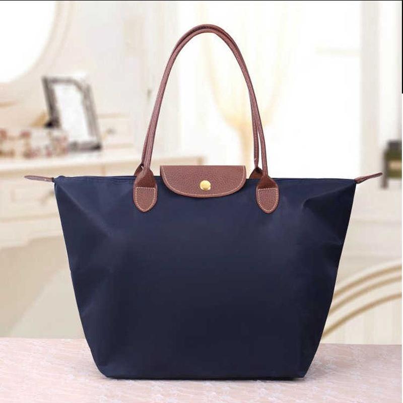 Neue Nylon Strand Tote Tasche Mode Frauen Handtasche Tote Oxford Schulter Taschen Weibliche Wasserdichte Knödel Falten Einkaufstasche