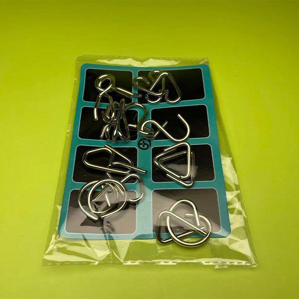 

Набор пряжек Intelligence: Кольцо ABC из 8 деталей и 9-звеньевая обучающая металлическая игрушка из 30 деталей