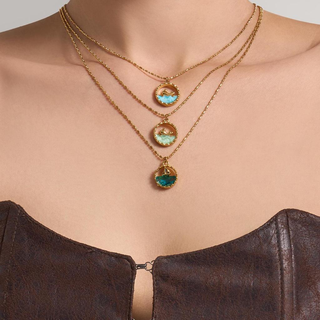 Ocean Series: 18K Gold-Plated Whale & Starfish Pendant Necklace.
