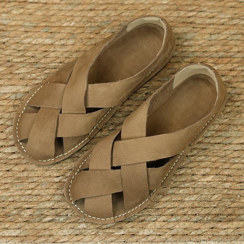 Baotou sandals women's summer 2025 new retro solid color hand-woven flat bottom round head casual Roman women's sandals