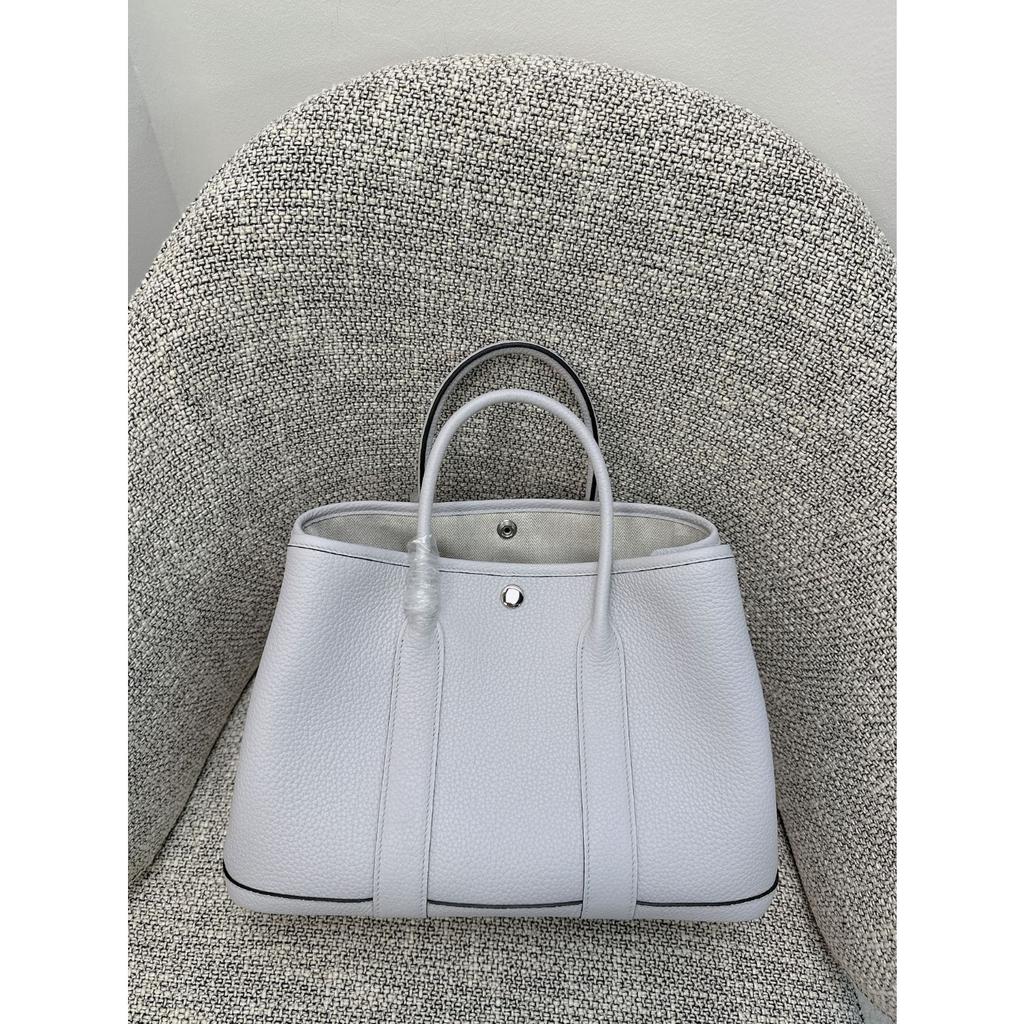Borsa da giardino cucita a mano con filo cerato, ferramenta interamente in acciaio, borsa da donna portatile in pelle bovina primo strato con motivo a collo di mucca Ntogo