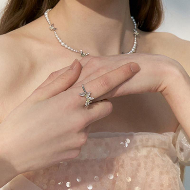 Stylish Copper Butterfly Ring With Dazzling Zircon Stones For Unique Fashion Statement