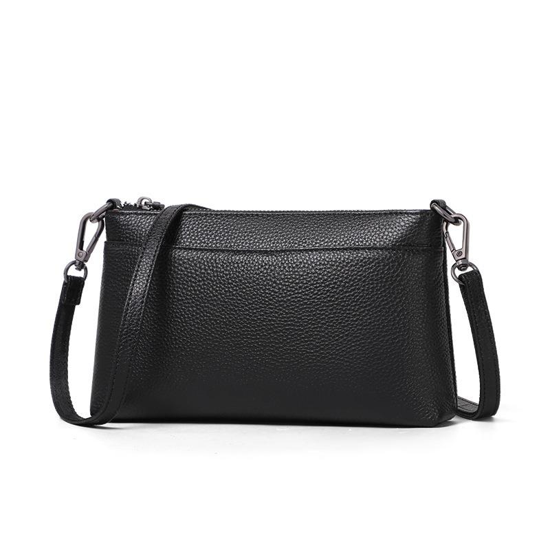 Frühling und Sommer neue schwarze Litschi-Muster weiches Leder Unterarmtasche vielseitige Schulter-Umhängetasche lässige Pendlertasche