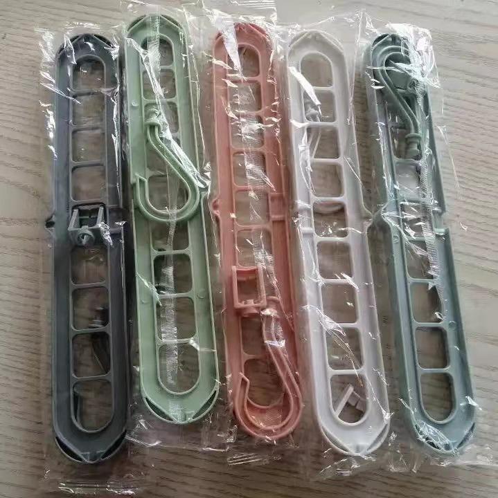Magic Nine-Hole Anti-Slip Folding Hanger: Multi-functional Clothes Drying and Storage Solution