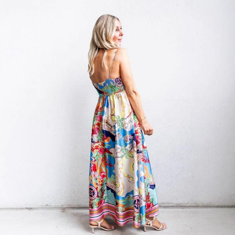 Letní dámské šaty s vysokým pasem, potiskem a halterovým stylem