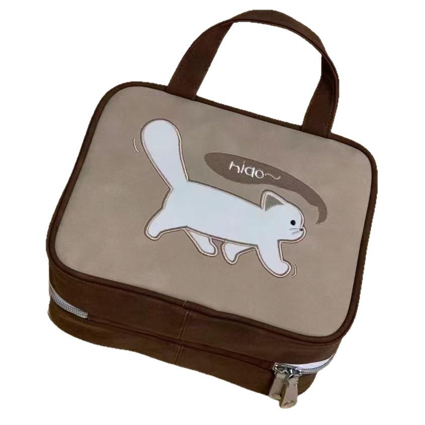 Spacious Cartoon Travel Makeup Bag: Portable, Multi-Compartment, and Three-in-One Design
