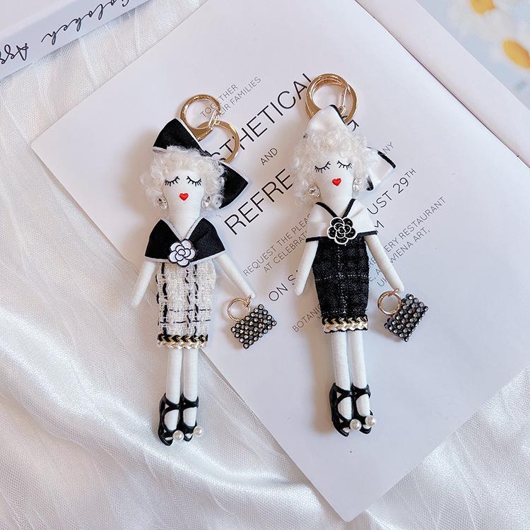 Camellia Shawl Girl Keychain: Fashionable Doll Bag Charm