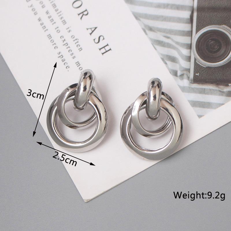 New Fashion Twist Dangle Earrings for Women Exaggerated Gold Color Metal Wrap Earrings European Ear Zircon oorbellen