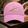 A Cap Featuring The Letters BASS with a Design That Incorporates Musical Notes Bass Guitars And Music Symbols This Stylish