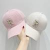 Chic Winter Baseball Cap with Rhinestone 'R' - Warm, Ear-Protecting Knit Hat for Women | Perfect for Outdoor Activities & Casual Wear