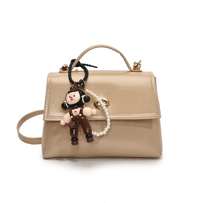 French simple high-end temperament oil wax leather portable small square bag women's commuting versatile solid color casual style messenger bag