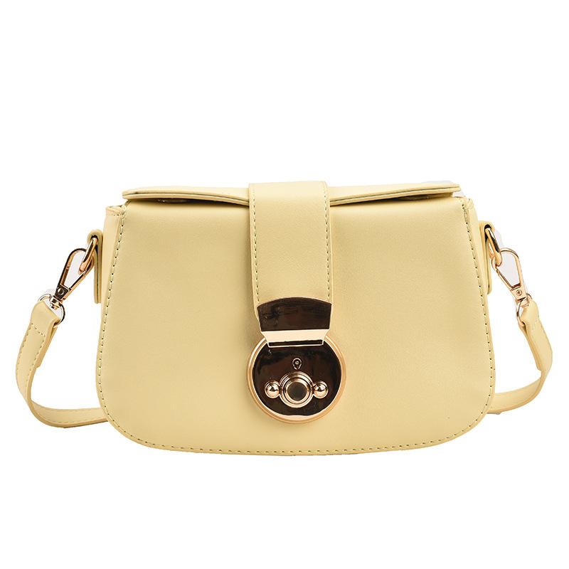 

French new niche simple high quality solid color saddle bag design temperament commuting versatile messenger bag women