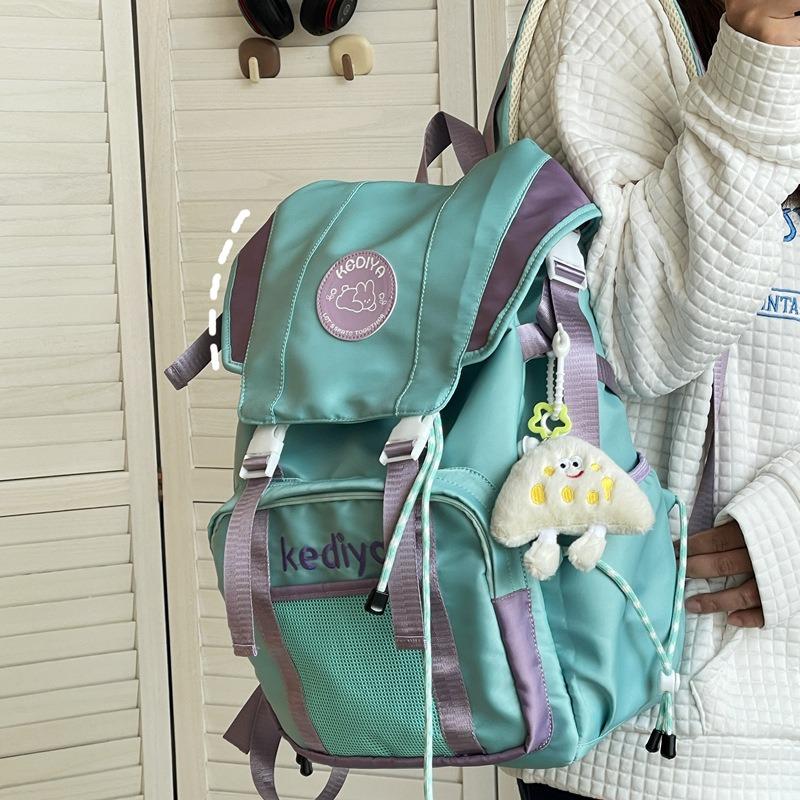 Large capacity backpack, new college student schoolbag, leisure travel nylon backpack.