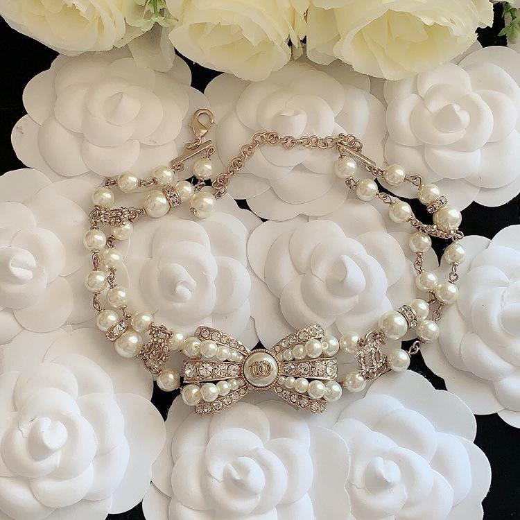 Xiangjia Xiaoxiangfeng Bow Short Collarbone Necklace Brooch Women's Simple Stud Earrings