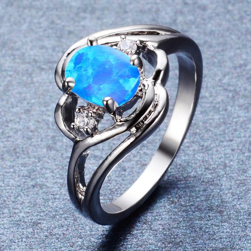 

Hollow White Gold Oval Blue and White Opal Micro Diamond Versatile Ring no. 10 синій