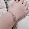 Interlocking Hearts High-End Women's Bracelet - Creative, Simple, Hollow Heart Design