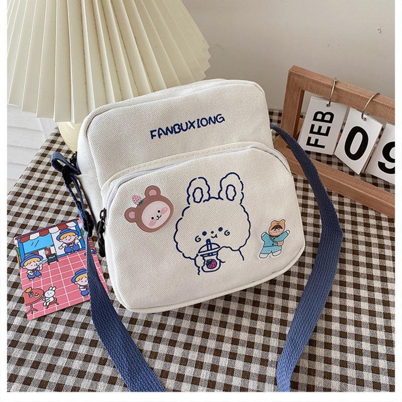 

Cute cartoon canvas mobile phone bag New Year s printed trendy portable sweet shoulder messenger bag pocket money