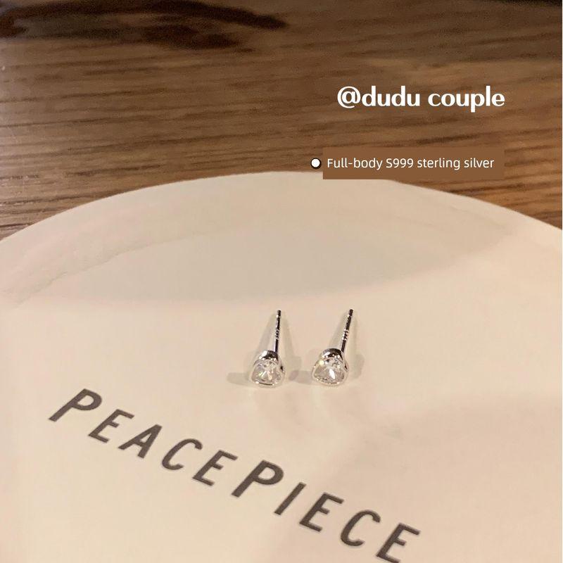 

Dudu Couple S999 Sterling Silver XINGX Stud Earrings Sleep-Free Heart Zircon Ear Worm Nail Ear Piercing Ear Bone Stud Women [S999 full body Silver] MINI Heart earring pair